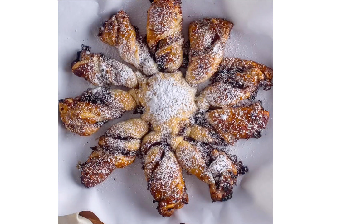 Blueberry Bourbon Pecan Jam in a puff pastry in the shape of a snowflake 