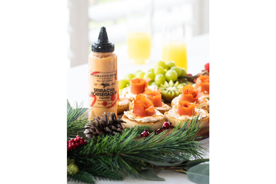 Mini Lox Bagels with Sriracha with Terrapin Ridge Farms Sriracha Horseradish Squeeze Garnishing