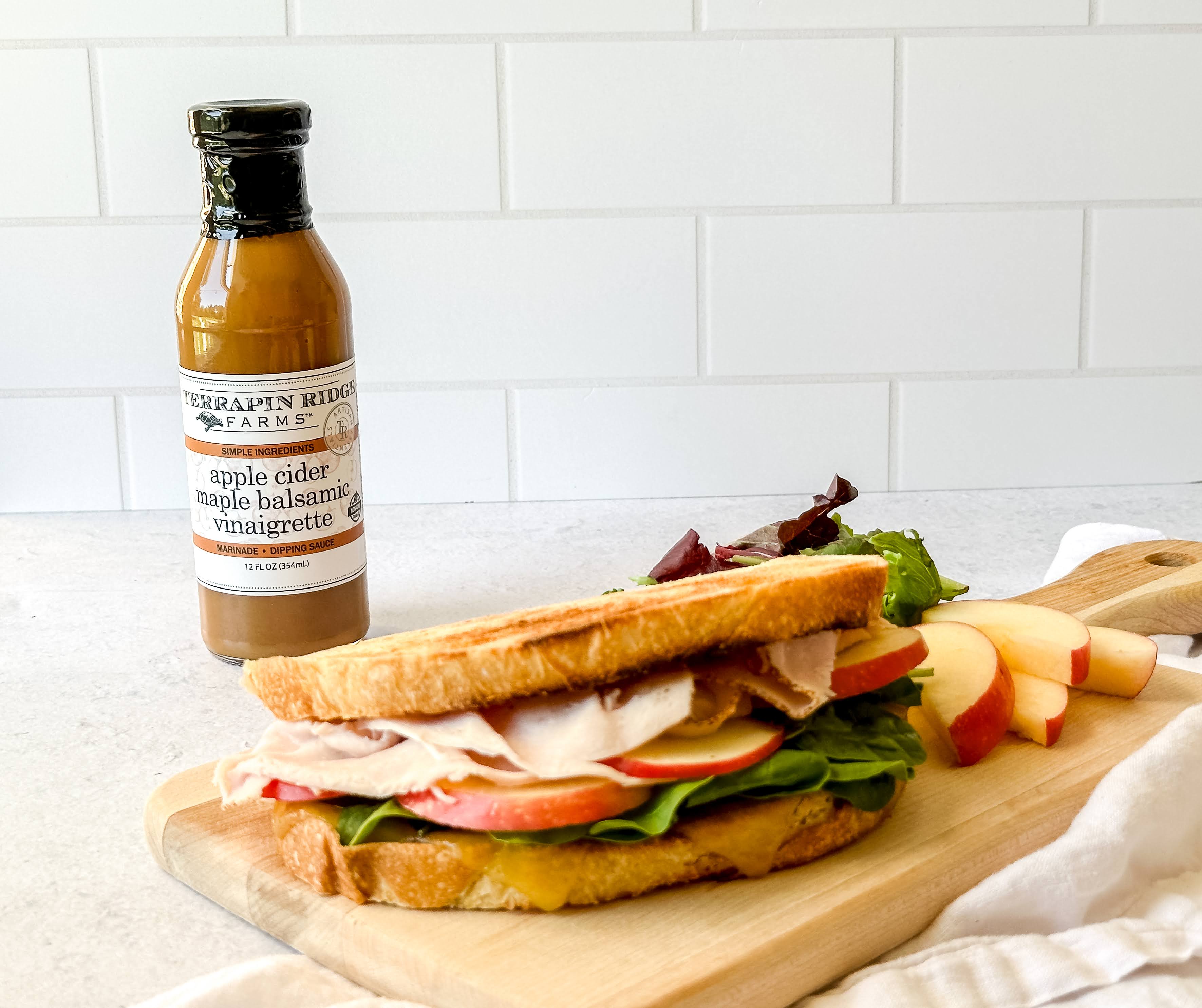 Turkey, Spinach, and Apple Sandwich with Apple Cider Maple Dressing