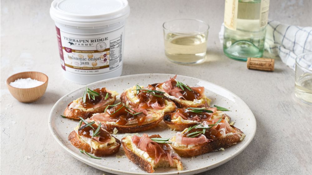 Balsamic Onion Jam Brie & Prosciutto Crostini with Terrapin Ridge Farms Balsamic Onion Jam