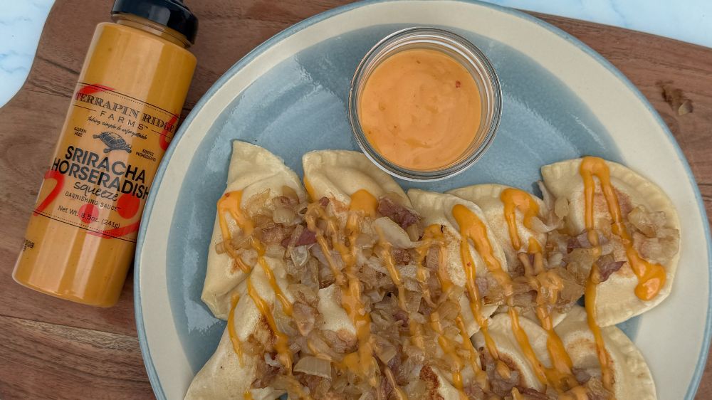 Loaded Pierogies with Sriracha Horseradish Garnishing Squeeze