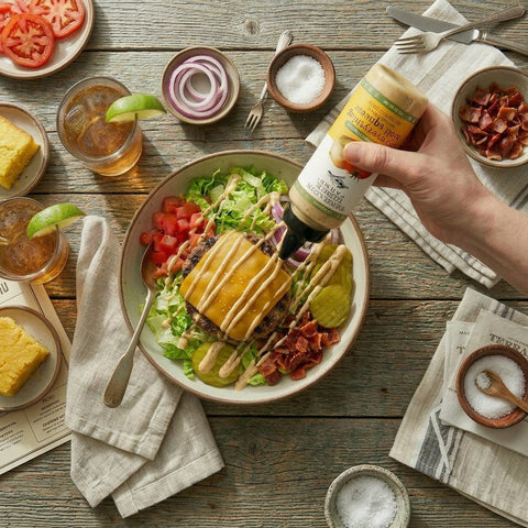 Loaded Cheeseburger Bowl with Avo Everything Aioli Garnishing Squeeze recipe